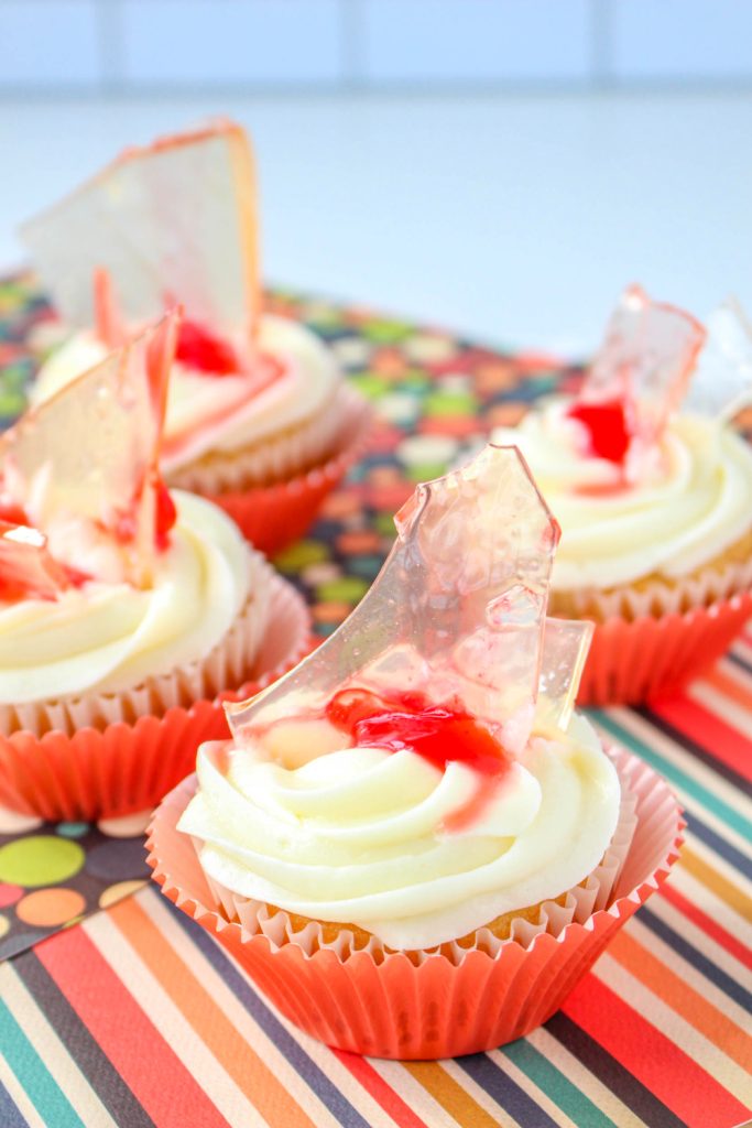 Halloween Broken Glass Strawberry Swirl Cupcakes on a table