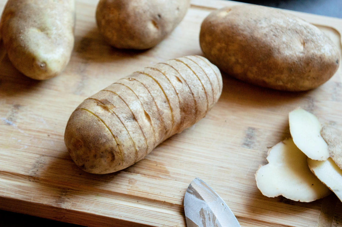 potatoes with slices cut into it