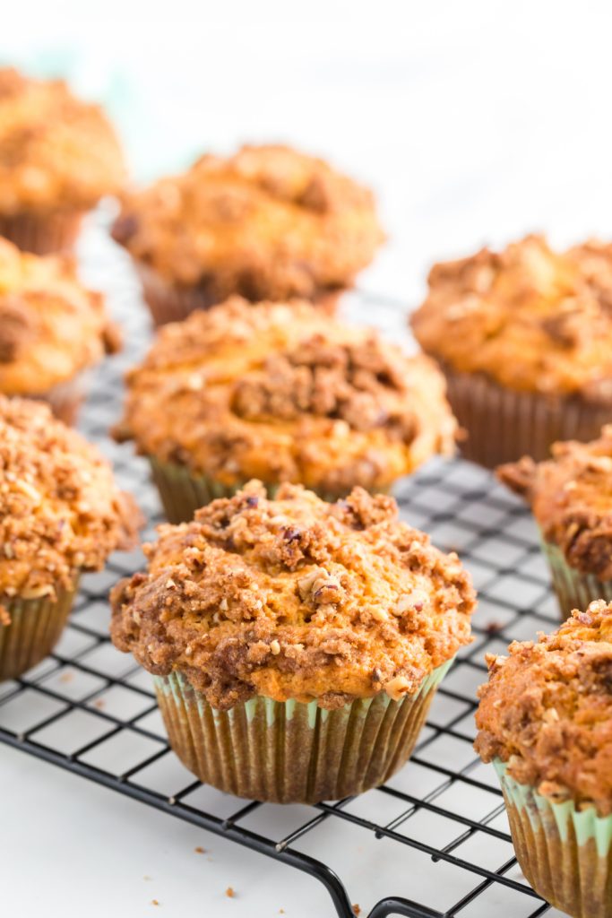 Pumpkin Pie Streusel Muffins on a rack