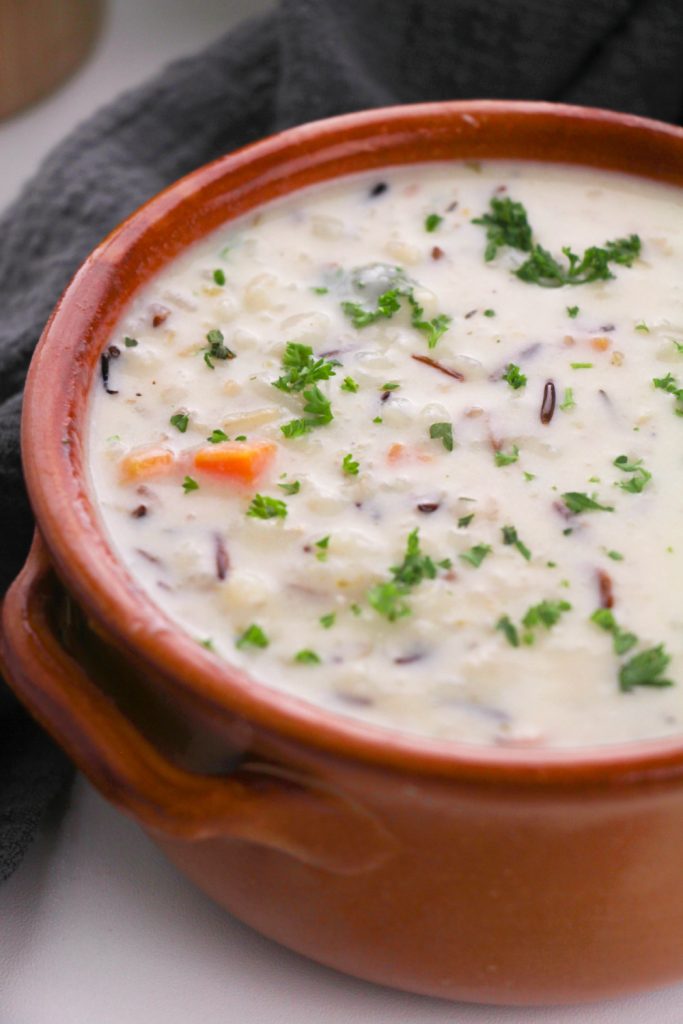 creamy wild rice soup in a bowl