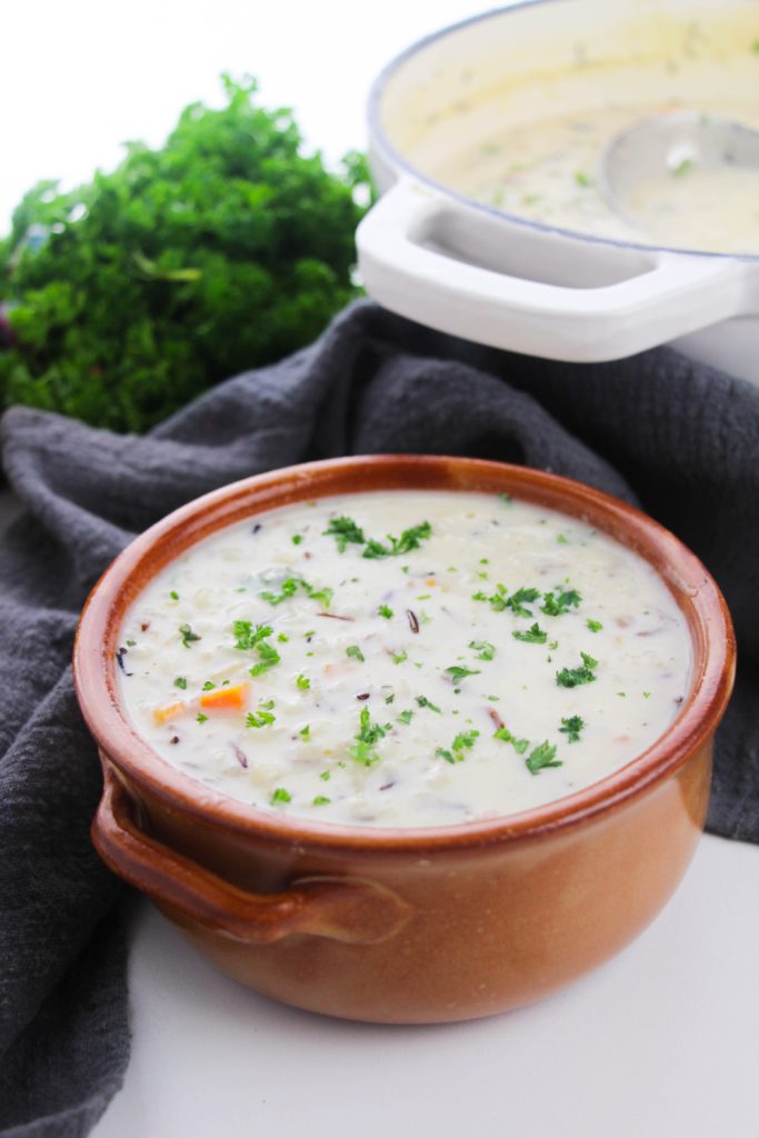 creamy wild rice soup  in a bowl