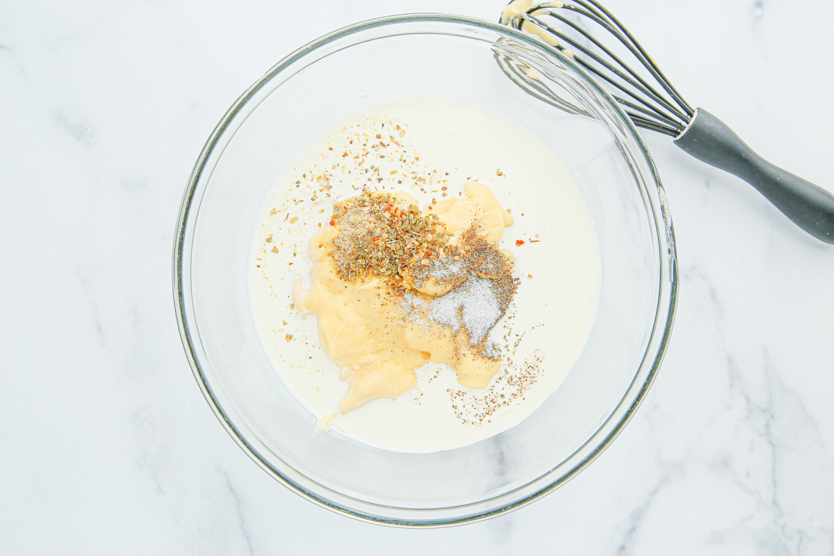 heavy cream, cream of chicken soup, and all the seasonings in a bowl