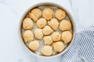 baked Cheeseburger Meatball Bomb Bites in a pan