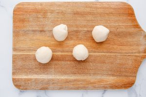 dough wrapped around meatballs