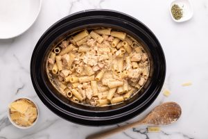 Slow Cooker Garlic Parmesan Chicken and Pasta in slow cooker