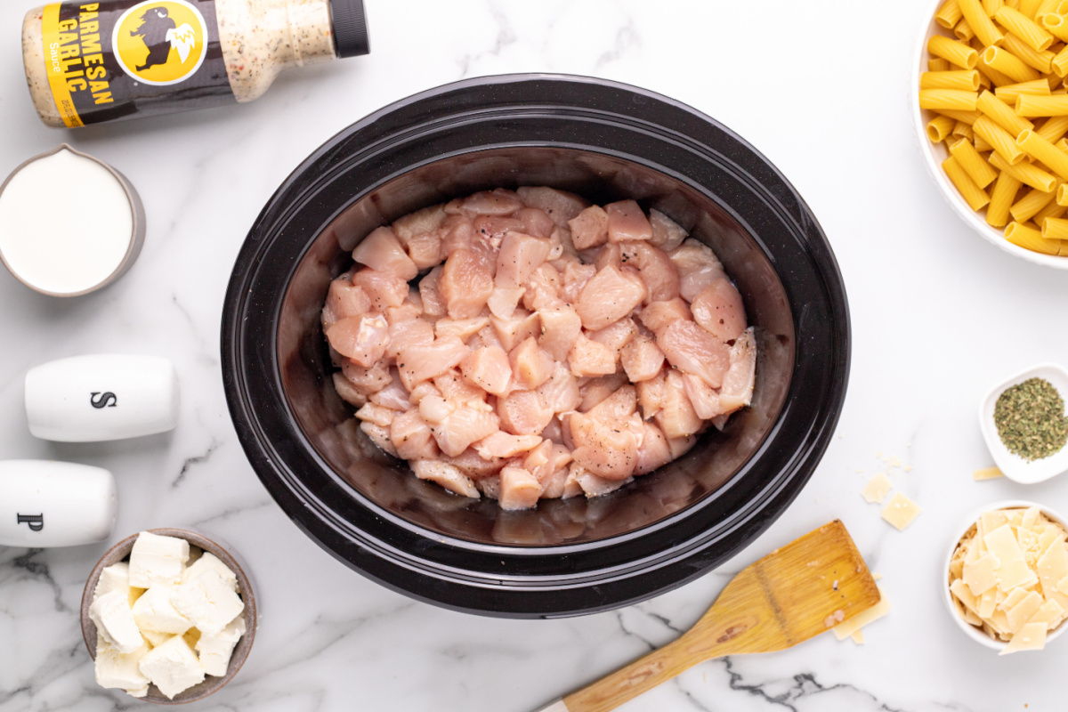 cubed chicken in a slow cooker