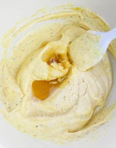 honey and lemon juice added to bowl