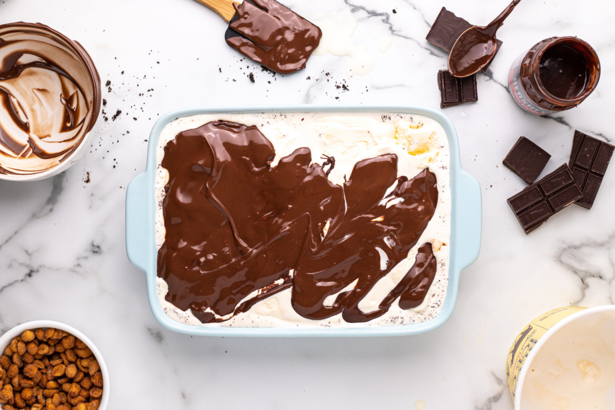 added melted chocolate to top of cake