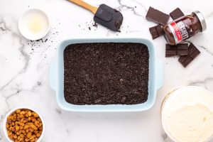 oreo crust pressed down in pan