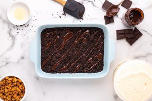 hot fudge drizzled on top of crust