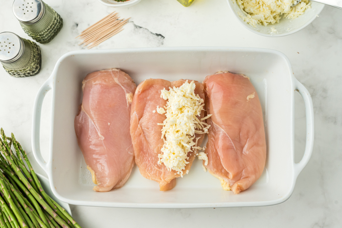 cheese mixture added to butterflied chicken