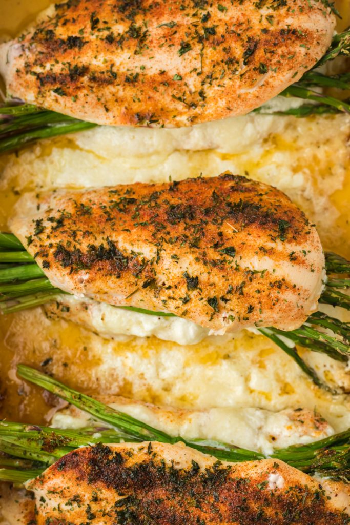 Creamy Asparagus Stuffed Chicken Breast in a baking dish