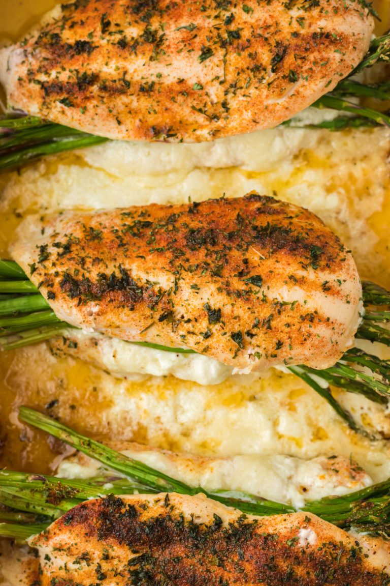 Creamy Asparagus Stuffed Chicken Breast in a baking dish
