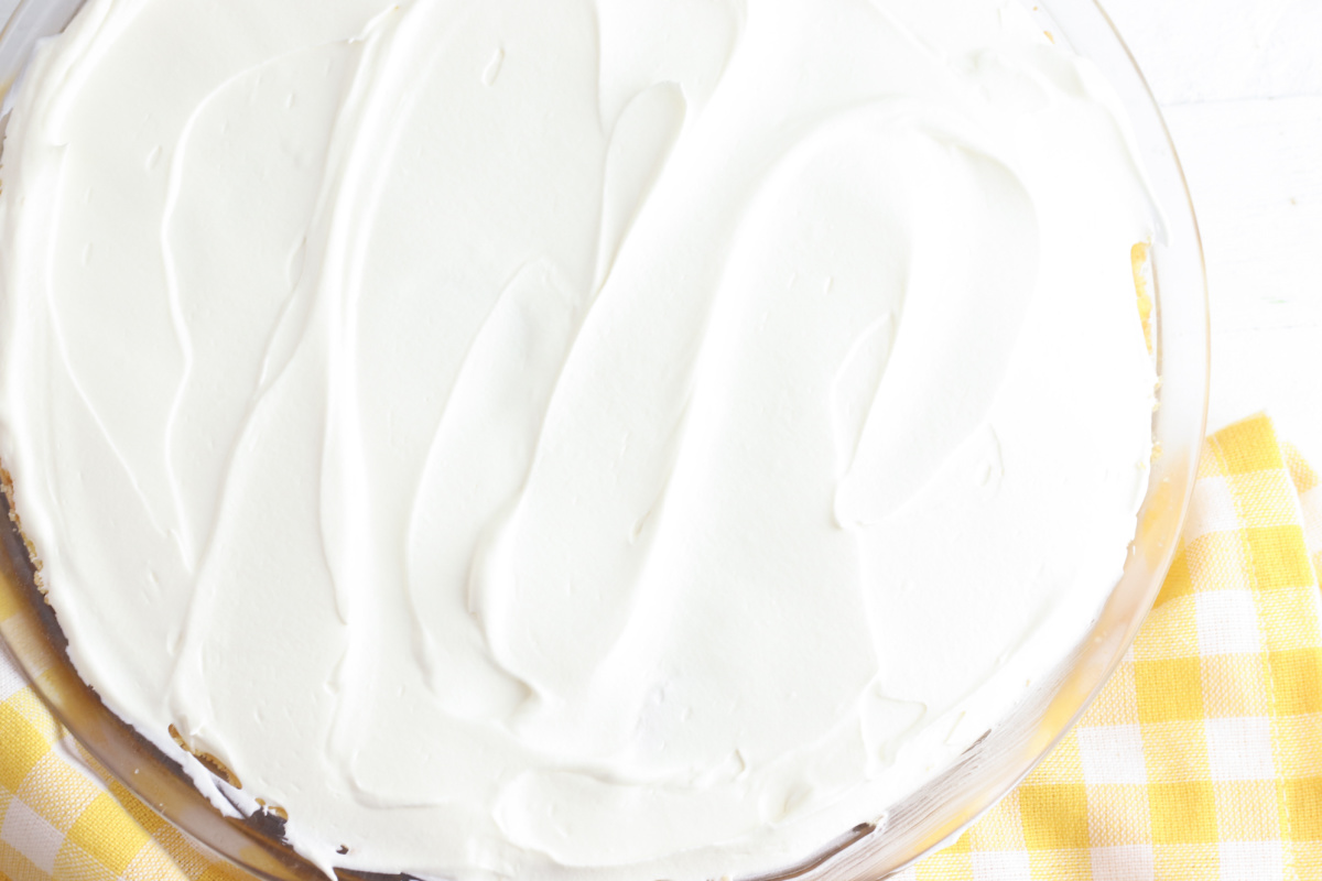 whipped topping added to top of banana slices