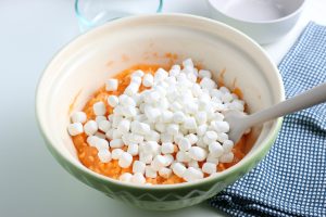 mini marshmallows added to bowl