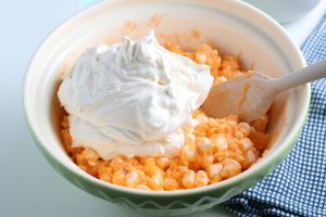 whipped topping added to bowl