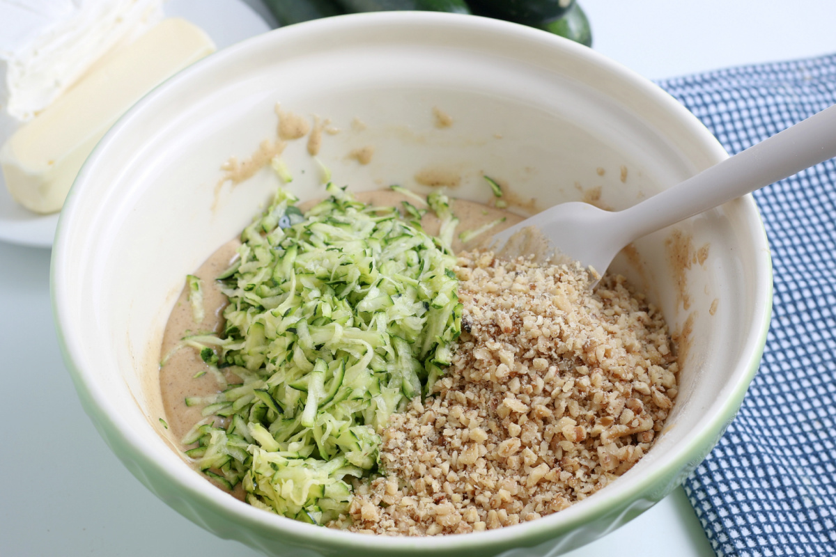 adding in nuts and zucchini