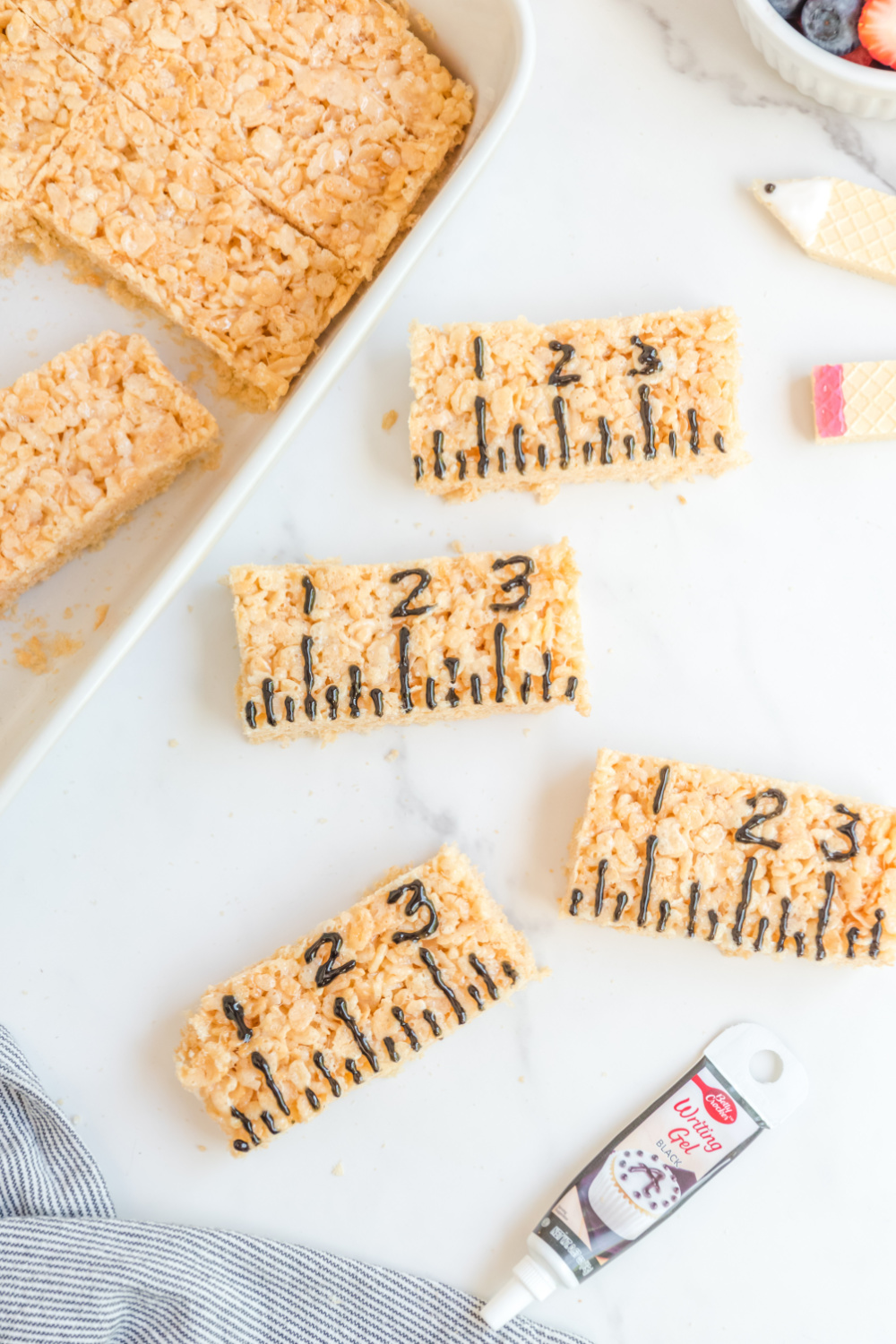 black gel food coloring lines and numbers added to rice krispy treats