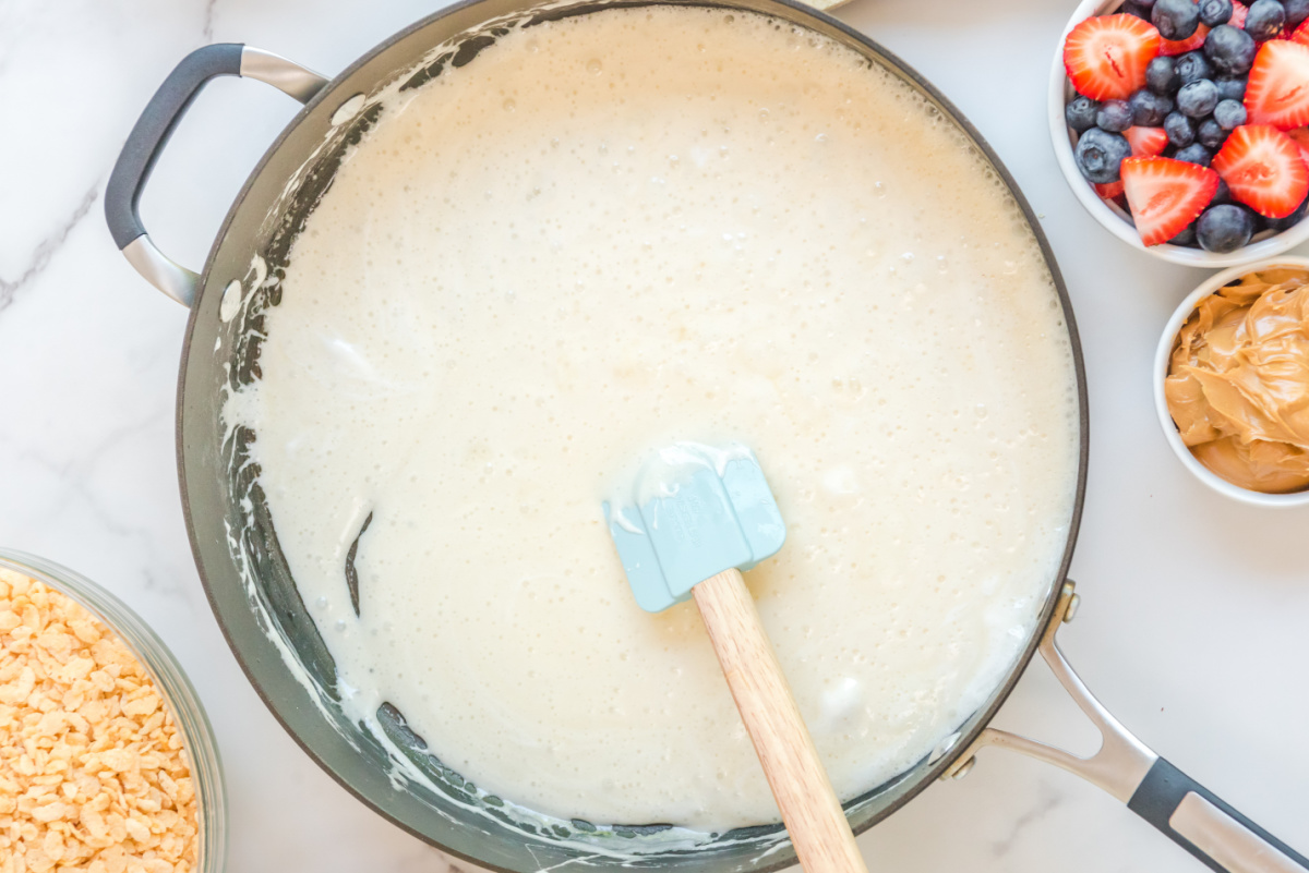 melted butter and marshmallows in a pan