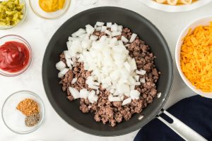 beef and onions in a pan