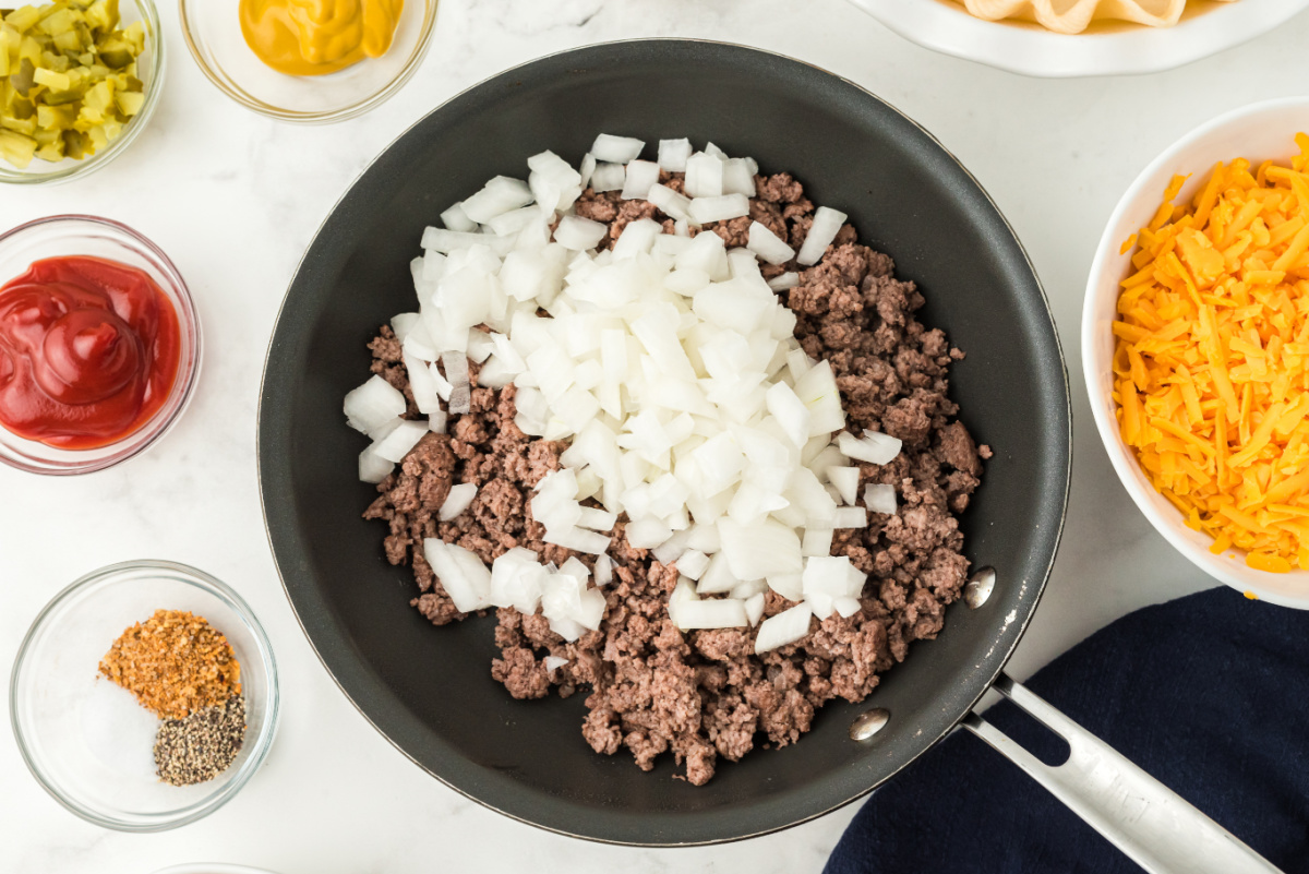 beef and onions in a pan