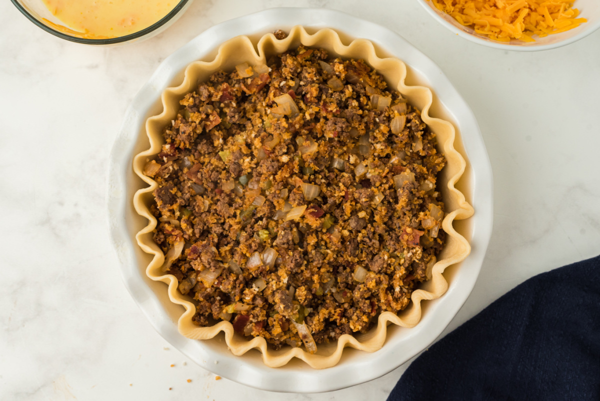 beef mixture added to pie crust