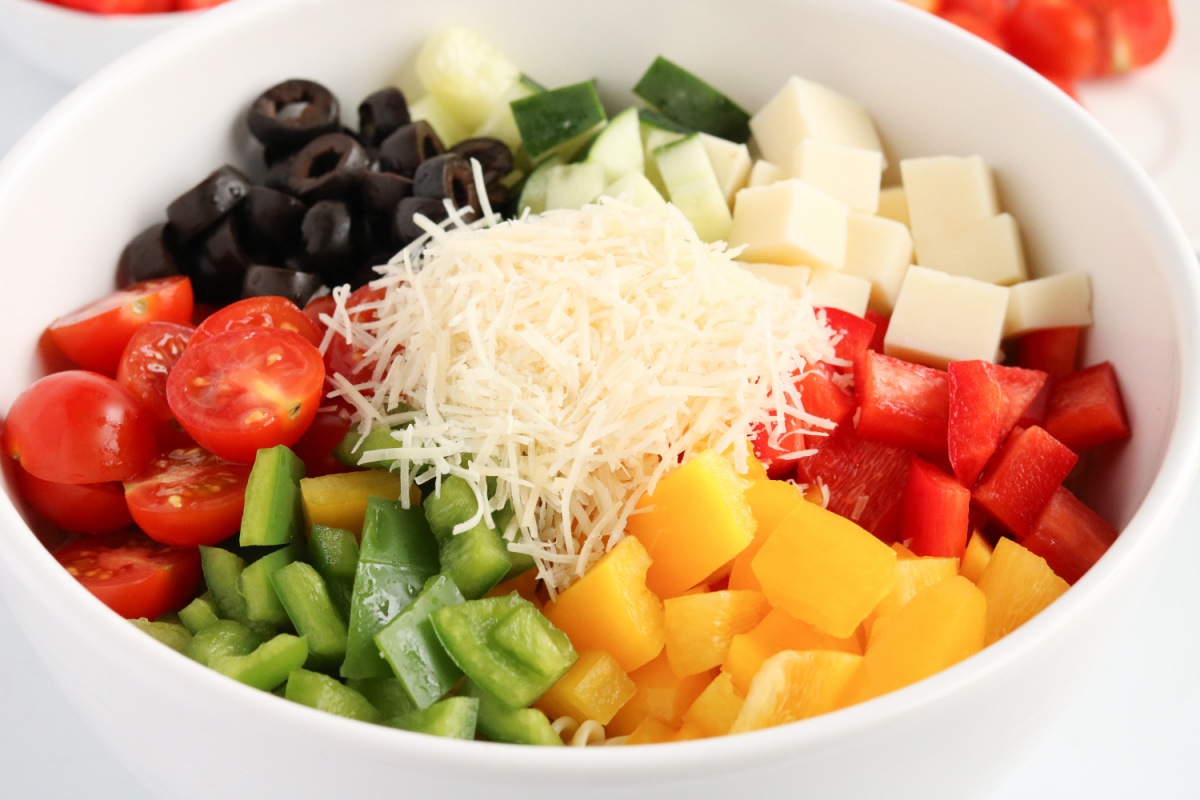 Classic Italian Pasta Salad ingredients in a bowl
