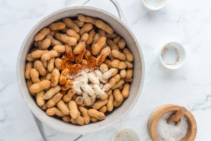 peanuts and seasoning in a bowl