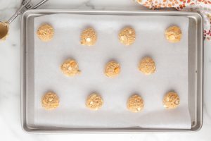 cookie batter placed on baking sheet