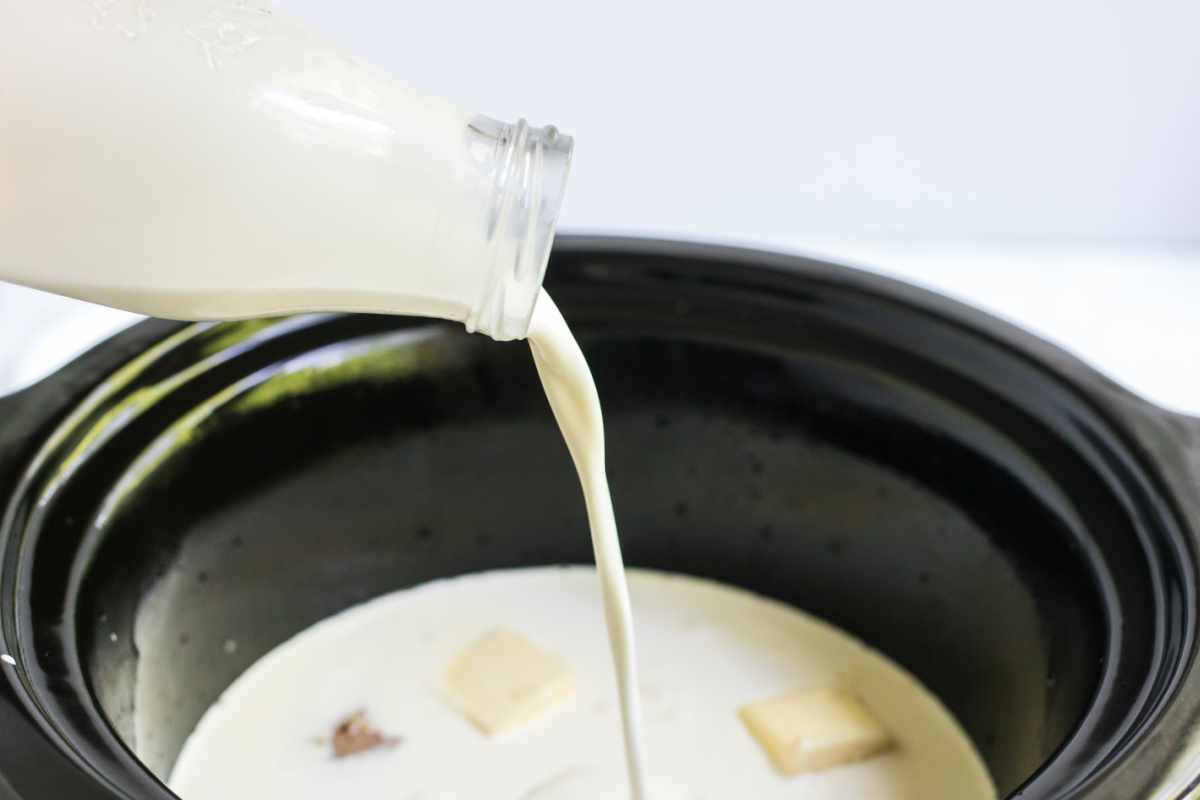 cream being added to slow cooker