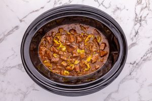 Slow Cooker Mississippi Steak Bites in a crock pot