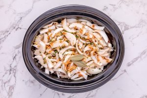 broth mixture added to slow cooker