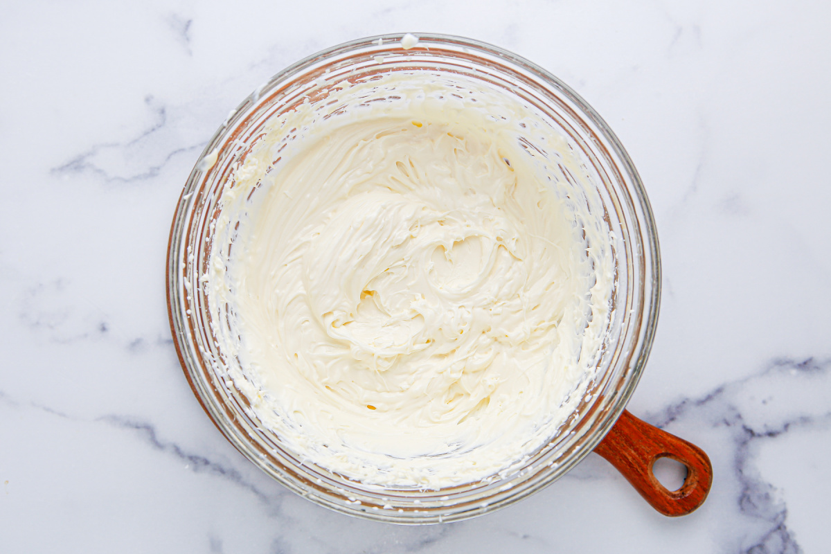 sour cream, mayo, cream cheese mixed in a bowl