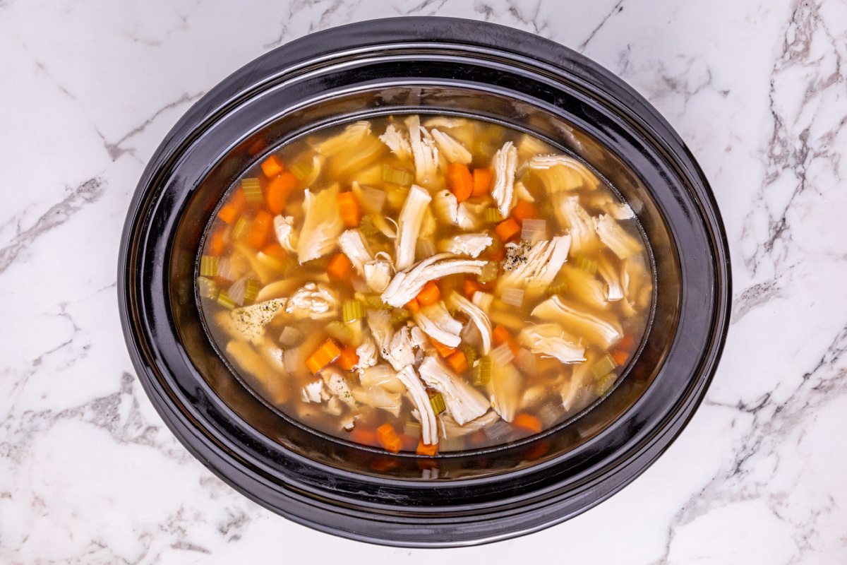 chicken broth or turkey broth, then add Worcestershire sauce, dried herbs, salt, pepper, and bay leaves added to slow cooker