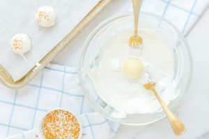 dipping truffles in chocolate mixture