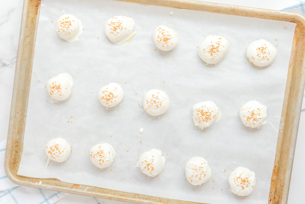 White Chocolate Champagne Truffles on a baking sheet