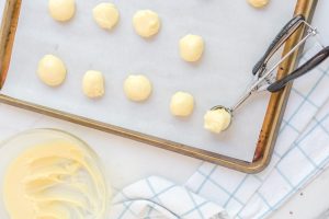 balls of truffle mixture on a baking pan