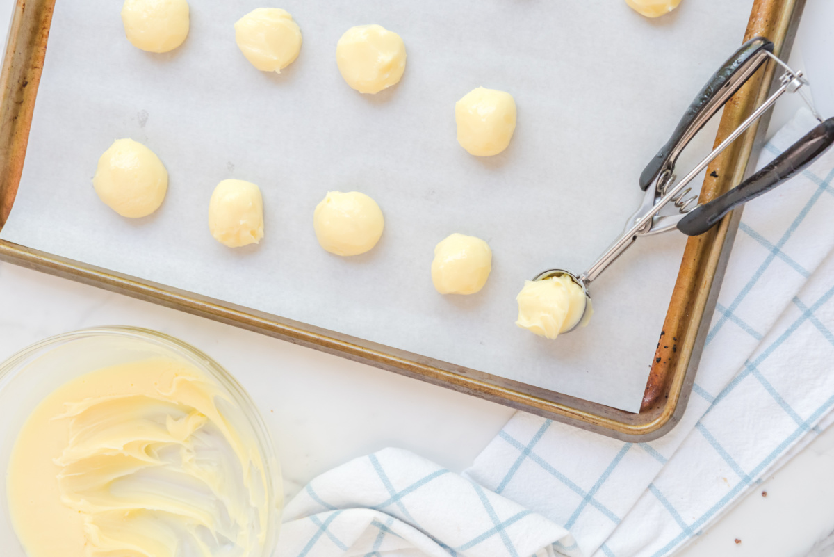 balls of truffle mixture on a baking pan