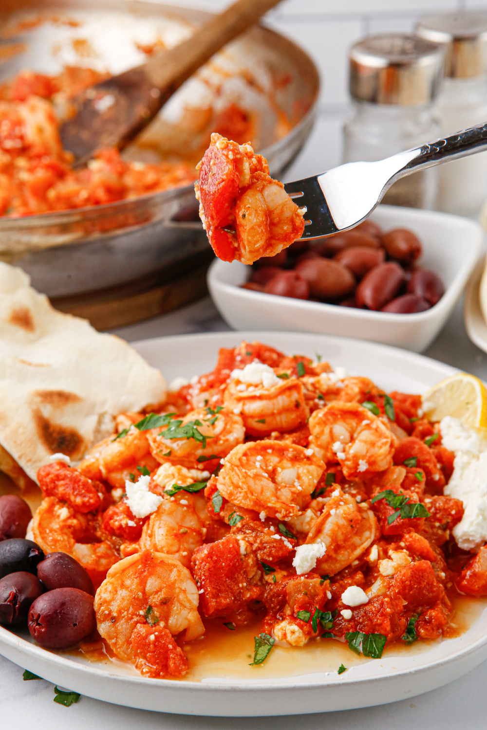 tomato feta shrimp skillet on a plate