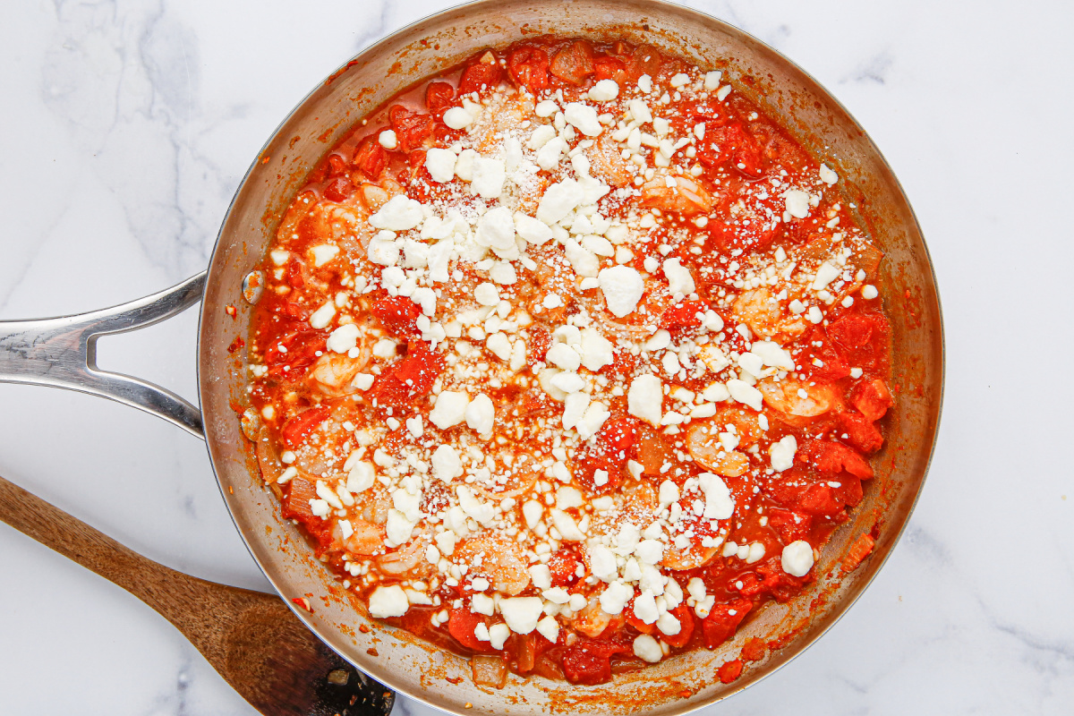 feta cheese added to pan