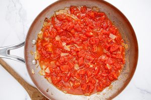 tomatoes added to the pan