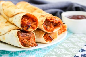 Air Fryer BBQ Pulled Pork Taquitos on a plate
