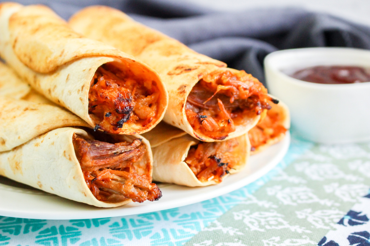 Air Fryer BBQ Pulled Pork Taquitos on a plate