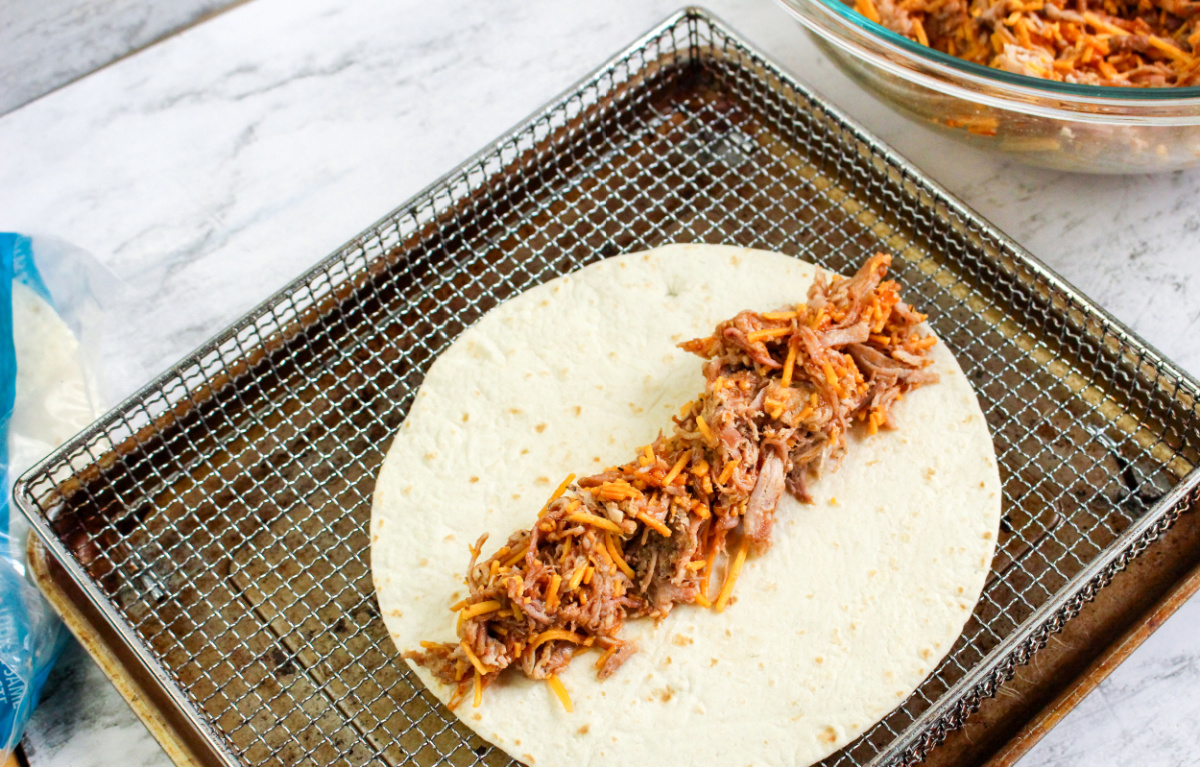 pork added to center of toritilla