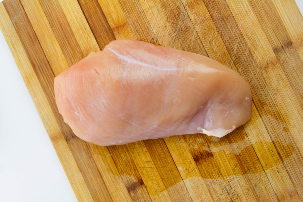 chicken breast on a cutting board