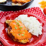 Cheesy Salsa Chicken on a plate with rice