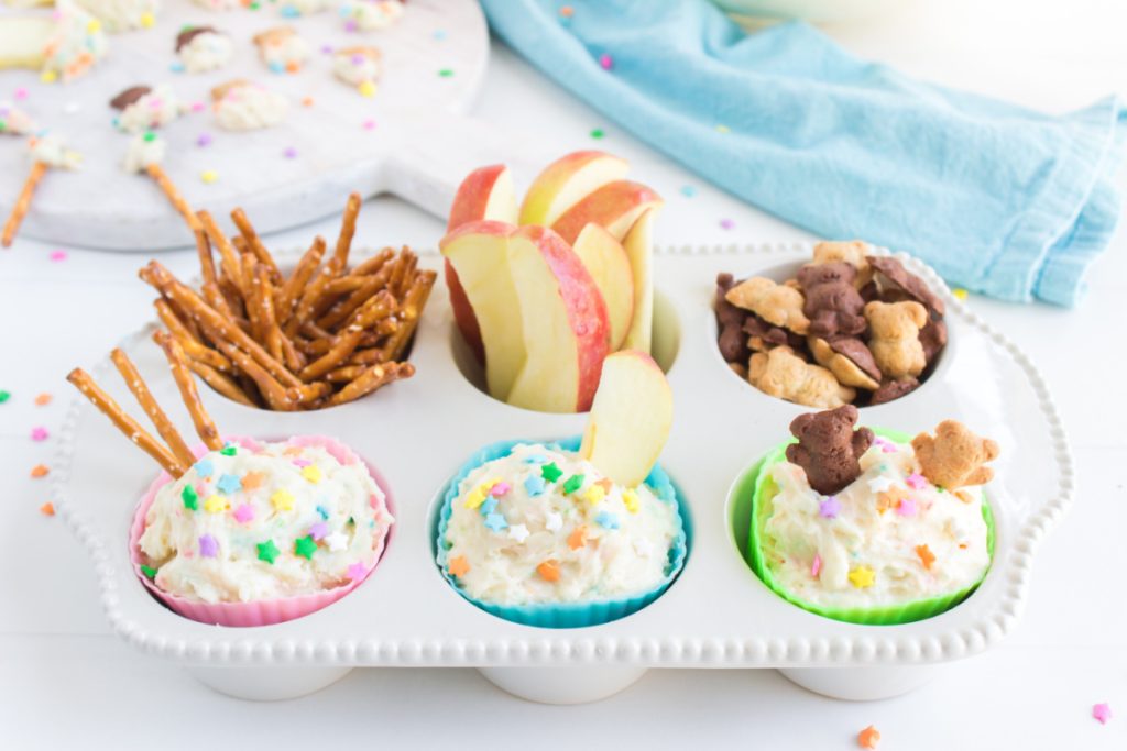 Copycat Dunkaroo Dip in muffin tin cups with dippers