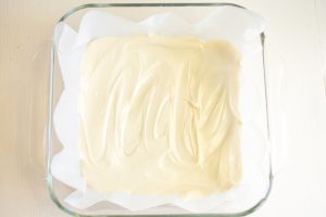 white chocolate spread into baking pan