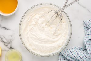 yogurt and cream cheese mixed in a bowl