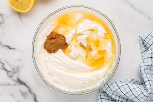 honey, lemon juice, and ground cinnamon added to bowl